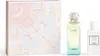 A gift set of Hermès perfume and lotion with decorative packaging. Voir les images du produit
