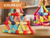 Two magnetic building block structures are displayed on a wooden surface, with a logo overlay in the top left corner. Produktbild-Vorschau