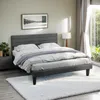 A bedroom scene with a bed, nightstand, and window. Produktbild-Vorschau