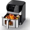A close-up shot of a black and silver air fryer with a roasted chicken and vegetables inside the basket. Podgląd zdjęcia produktu