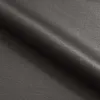 A close-up, angled view of a folded piece of dark gray fabric, likely upholstery or drapery material. The fabric has a subtle texture and sheen. Podgląd zdjęcia produktu