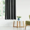 A living room scene with a curtain, a coffee table with a vase of flowers, and a chair. Produktbild-Vorschau
