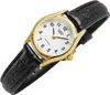 A close-up studio shot of a gold-toned Casio women's watch with a white face and a black leather strap. Produktbild-Vorschau