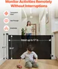 A hallway with a baby gate set up, a woman standing behind it and a child in front. Voir les images du produit