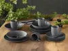 A set of stoneware dishes arranged on a wooden table with greenery in the background. Náhľad obrázku produktu