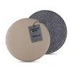 A round cushion with a tag attached, shown from a slightly elevated angle. Produktbild-Vorschau