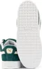 The image shows the sole and heel of a pair of green Puma Suede XL sneakers against a white background. Produktbild-Vorschau