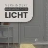 A product marketing image showing a door with a draft stopper at the bottom and text overlay. Náhľad obrázku produktu