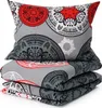 A stack of folded bedding, including a pillow and duvet covers, with a decorative pattern. Produktbild-Vorschau