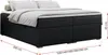 A black upholstered bed frame with white bedding and pillows, shown from a side angle with dimensions indicated. Produktbild-Vorschau