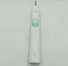 A white electric toothbrush with a green button is shown against a light gray background. Produktbild-Vorschau