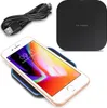 A wireless charger, a USB cable, and a smartphone are arranged on a white background. Produktbild-Vorschau