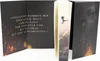 A book with a slipcase, showing the open cover with text and the book itself with its slipcase. Produktbild-Vorschau
