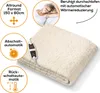 A folded cream-colored electric blanket with a controller attached, shown with marketing callouts and a lifestyle image of a woman sleeping. Produktbild-Vorschau