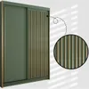 A green wardrobe with golden lamella details, shown in a studio setting with light casting shadows. Náhled obrázku produktu