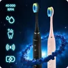 Two electric toothbrushes, one black and one pink, are displayed against a dark, starry background with glowing blue energy effects. Icons representing features like water drops, clean teeth, vibrations, and battery charge are shown on the left. Náhled obrázku produktu