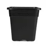 A black square plant pot with a Greek key pattern around the rim, shown against a white background. Produktbild-Vorschau