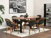 A dining room setting with a wooden oval table and black chairs, a large framed picture of a classic car on the wall, and a black bookshelf. Voir les images du produit