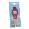 A red bottle opener is packaged on a blue cardboard backing. Náhľad obrázku produktu