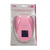 A pink paper punch in its retail packaging. Produktbild-Vorschau