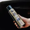 A hand holding a can of K2 Klima Doctor A/C cleaner inside a car. Anteprima dell’immagine prodotto