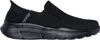 A black Skechers slip-on shoe is shown from the side against a white background. Voir les images du produit