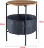 A round side table with a wooden top and a black fabric storage basket underneath, shown with dimensions indicated by red lines and text. Náhled obrázku produktu