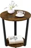 A round side table with a rustic brown wood top and black metal legs, featuring a vase with flowers and a cup of coffee on top, and two books on the lower shelf. Produktbild-Vorschau