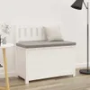 A white wooden storage bench with a gray cushion and a beige pillow, placed against a white wall. Náhled obrázku produktu