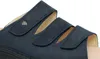A close-up view of a navy blue sandal with adjustable straps. Produktbild-Vorschau