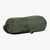 A green sleeping bag is shown against a white background. Voir les images du produit