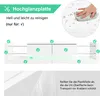 A white TV stand with LED lighting and a close-up of a hand cleaning a surface. Produktbild-Vorschau