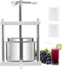 A fruit press with grapes and juice. Voir les images du produit