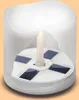 A cutaway view of a solar-powered LED candle with solar panels visible on the base. Produktbild-Vorschau