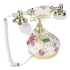 A vintage-style telephone with floral decorations. Náhľad obrázku produktu