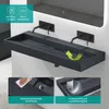 A modern bathroom sink with two faucets, showcasing its features. Produktbild-Vorschau