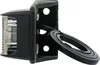 A close-up, side view of a black plastic corner bracket with a clear light fixture attached. A black ring is hanging from the bracket. Produktbild-Vorschau