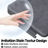 A hand touching a clear plastic sheet over a dark textured surface. Produktbild-Vorschau
