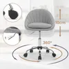 A gray fabric office chair with a chrome base and wheels, shown in a room with a blurred background. Produktbild-Vorschau