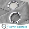 Close-up of silver grommets on gray outdoor curtains. Náhled obrázku produktu