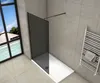 A modern bathroom with a walk-in shower, a window overlooking a tropical scene, and a heated towel rack. Produktbild-Vorschau