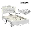 A diagram showing the dimensions of a white bed frame with a crown-shaped headboard and LED lighting, along with a separate diagram of a drawer. Voir les images du produit