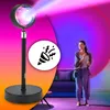 A woman dancing in a room lit by a sunset lamp, with a confetti icon overlay. Podgląd zdjęcia produktu