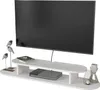 A white TV lowboard with a television and decorative items on a white background. Podgląd zdjęcia produktu