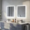 A modern bathroom vanity with two sinks and two illuminated mirrors above them. Anteprima dell’immagine prodotto