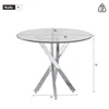 A round glass-top dining table with a silver metal base, shown with dimensions indicated. Náhľad obrázku produktu