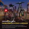An electric bicycle is shown at night with city lights in the background. Produktbild-Vorschau