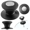 A collection of black pot lid handles with silver accents, displayed on a white background. Anteprima dell’immagine prodotto