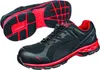 A pair of black and red Puma safety shoes, with one shoe shown from the side and the other from the sole. Anteprima dell’immagine prodotto
