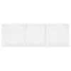 A white, three-compartment shelf unit against a white background. Náhled obrázku produktu